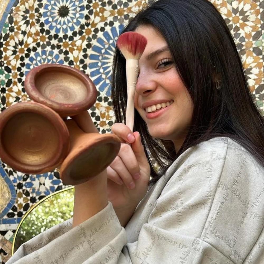 Traditional Moroccan Aker Fassi lipstick in clay pot – natural herbal cosmetic product